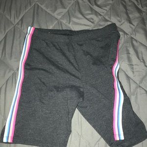 Shorts with rainbow stripes on the side
